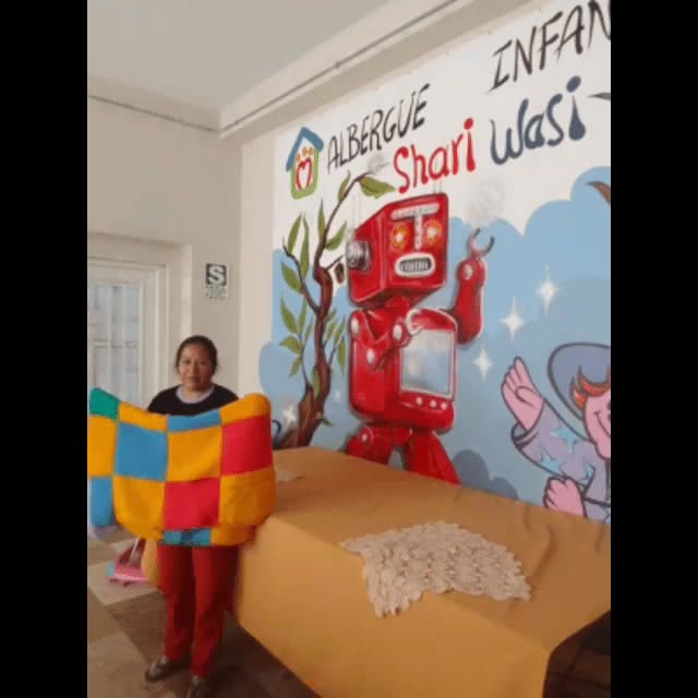 Mural infantil en una habitación de Shari Wasi
